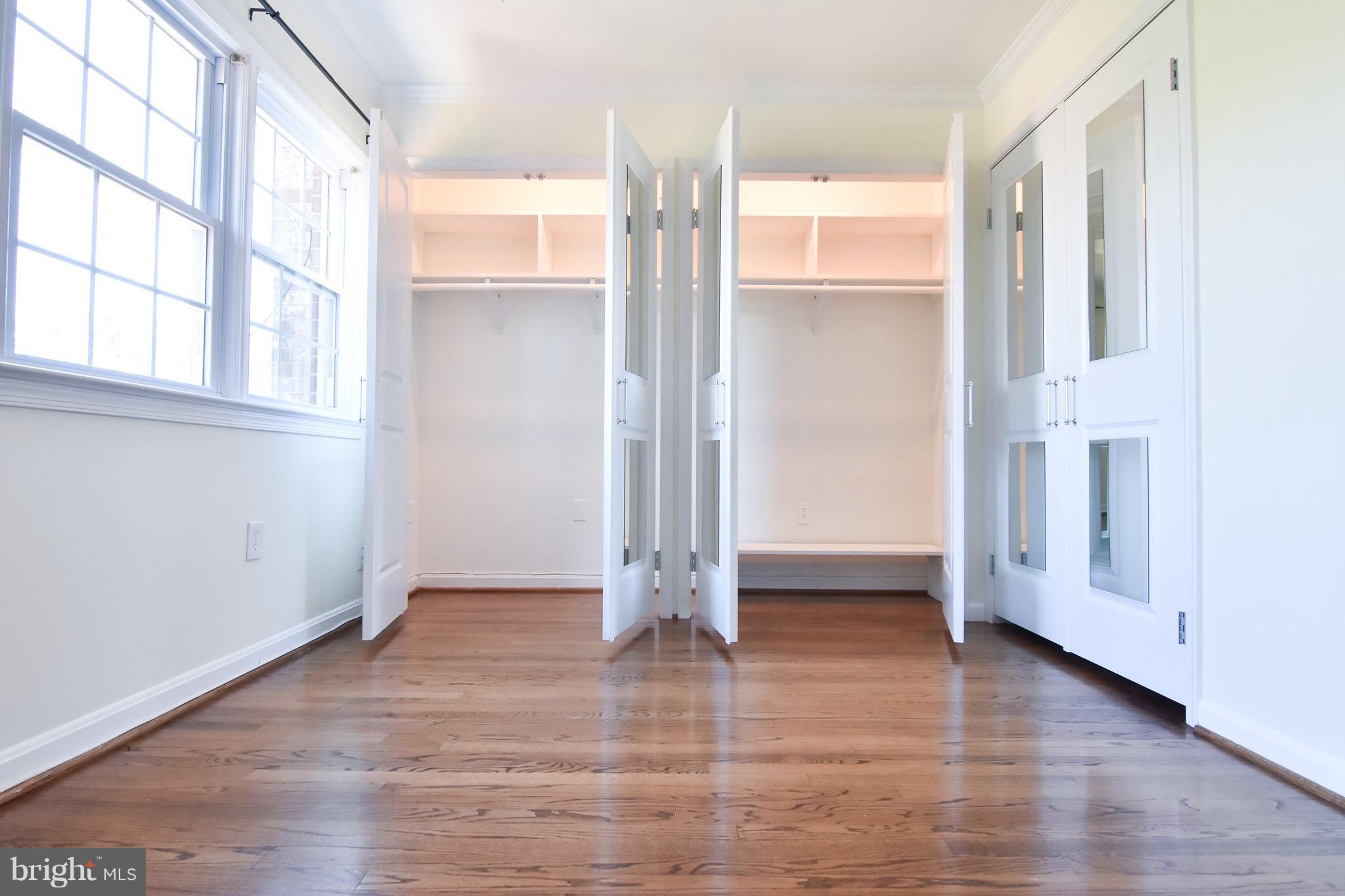 3302 Spring Lane Falls Church, VA 22041 - Photo 16 of 30 a view of an empty room with wooden floor and a window