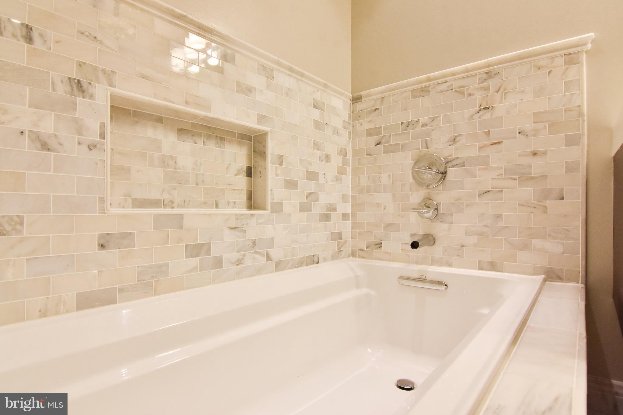3302 Spring Lane Falls Church, VA 22041 - Photo 18 of 30 a bathroom with a bathtub and shower