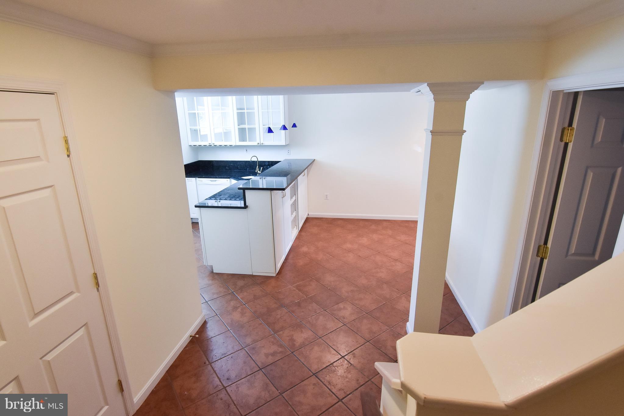 3302 Spring Lane Falls Church, VA 22041 - Photo 20 of 30 a room with a sink and a refrigerator