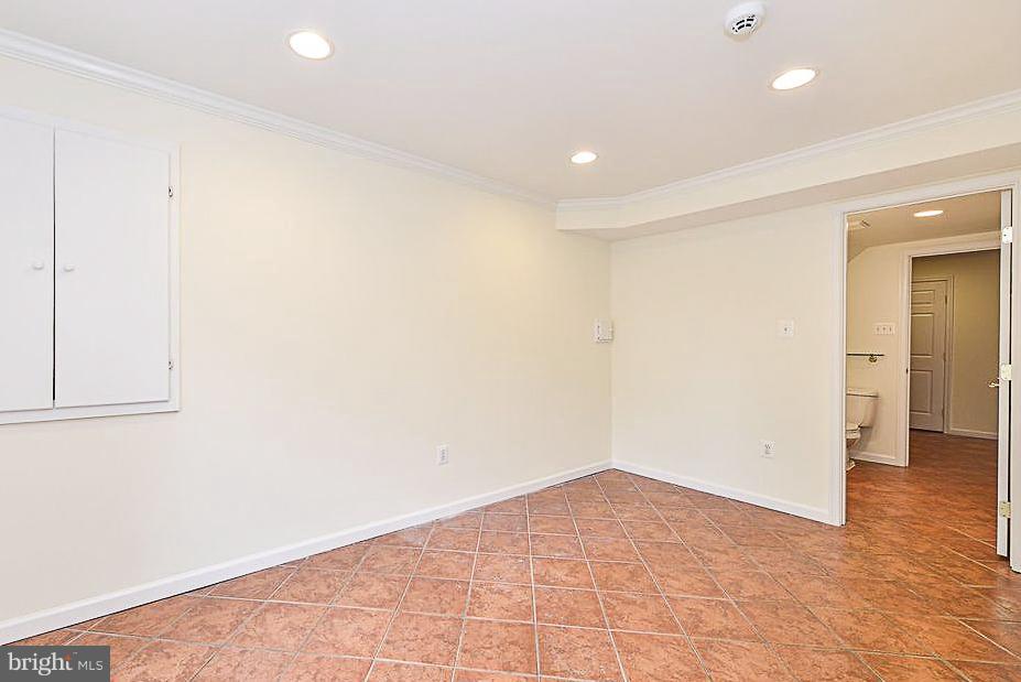3302 Spring Lane Falls Church, VA 22041 - Photo 24 of 30 an empty room with wooden floor