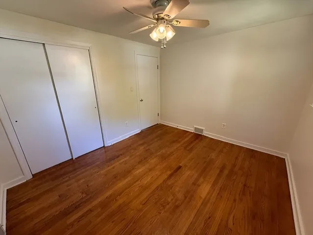 wooden floor in a hall with an entryway