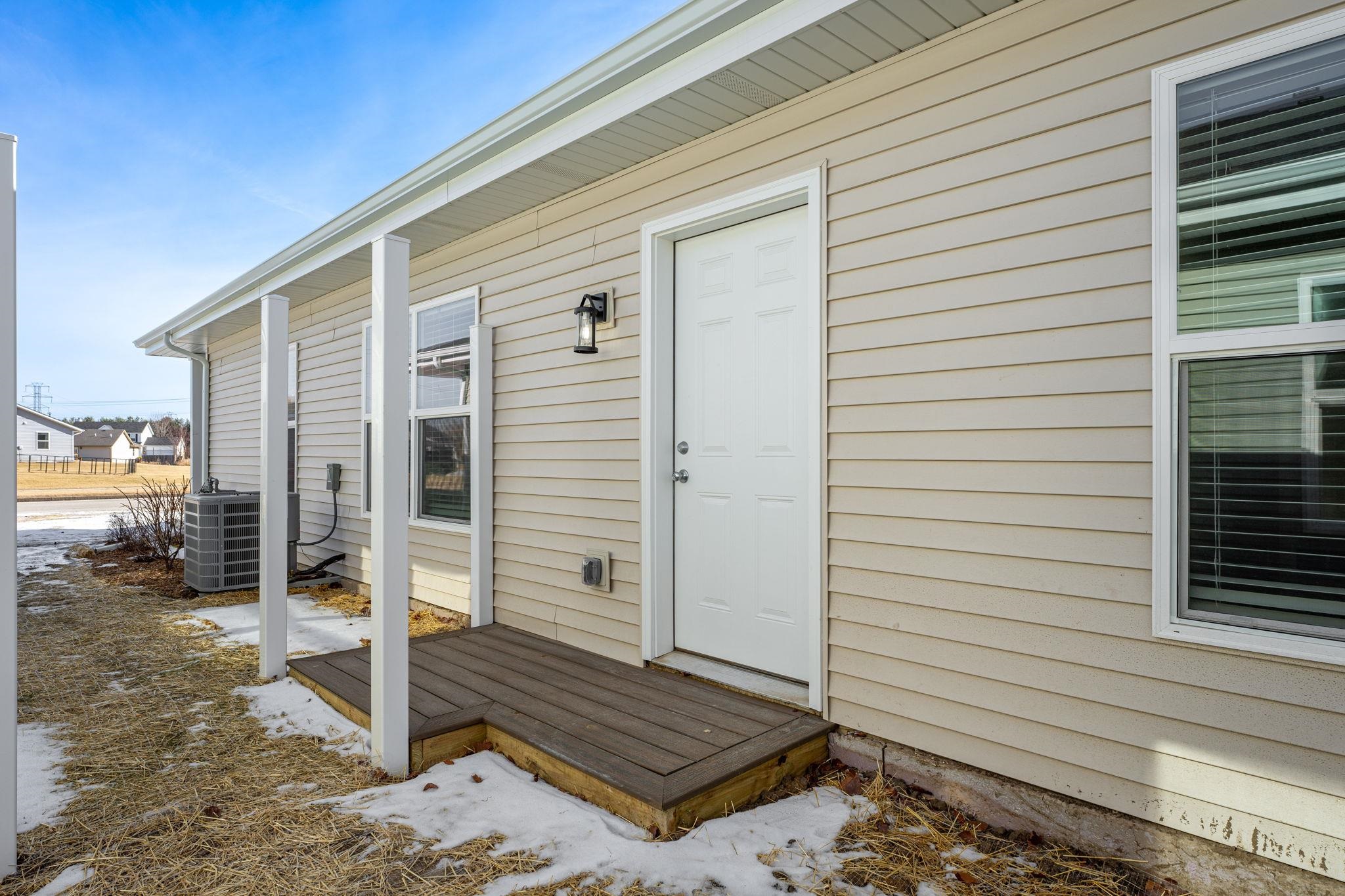 898 Fuller Lane Belvidere, IL 61008 - Photo 26 of 29 a view of a porch with a door
