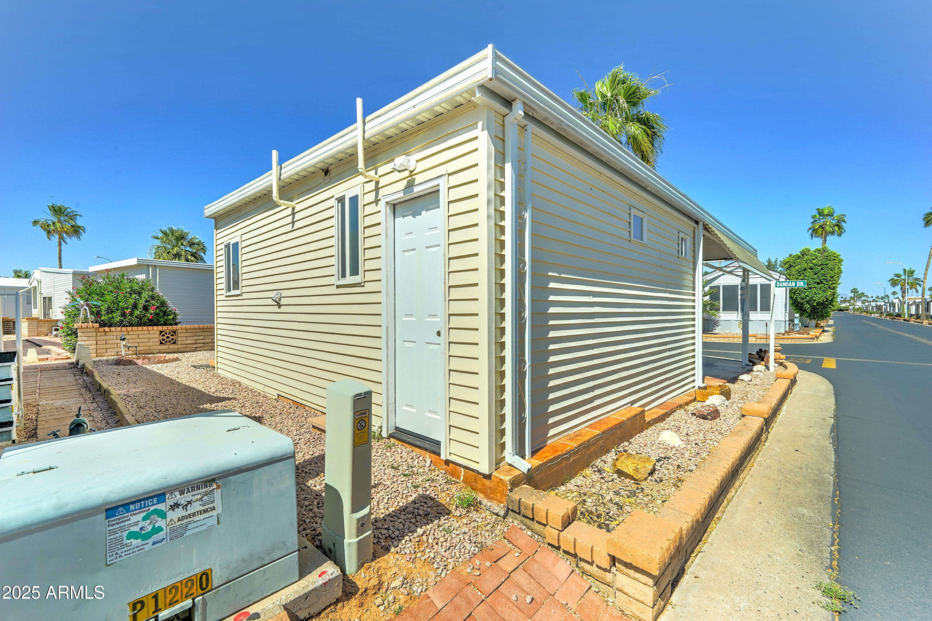 111 South Greenfield Road, Unit 547 Mesa, AZ 85206 - Photo 21 of 28 Storage shed at rear of home