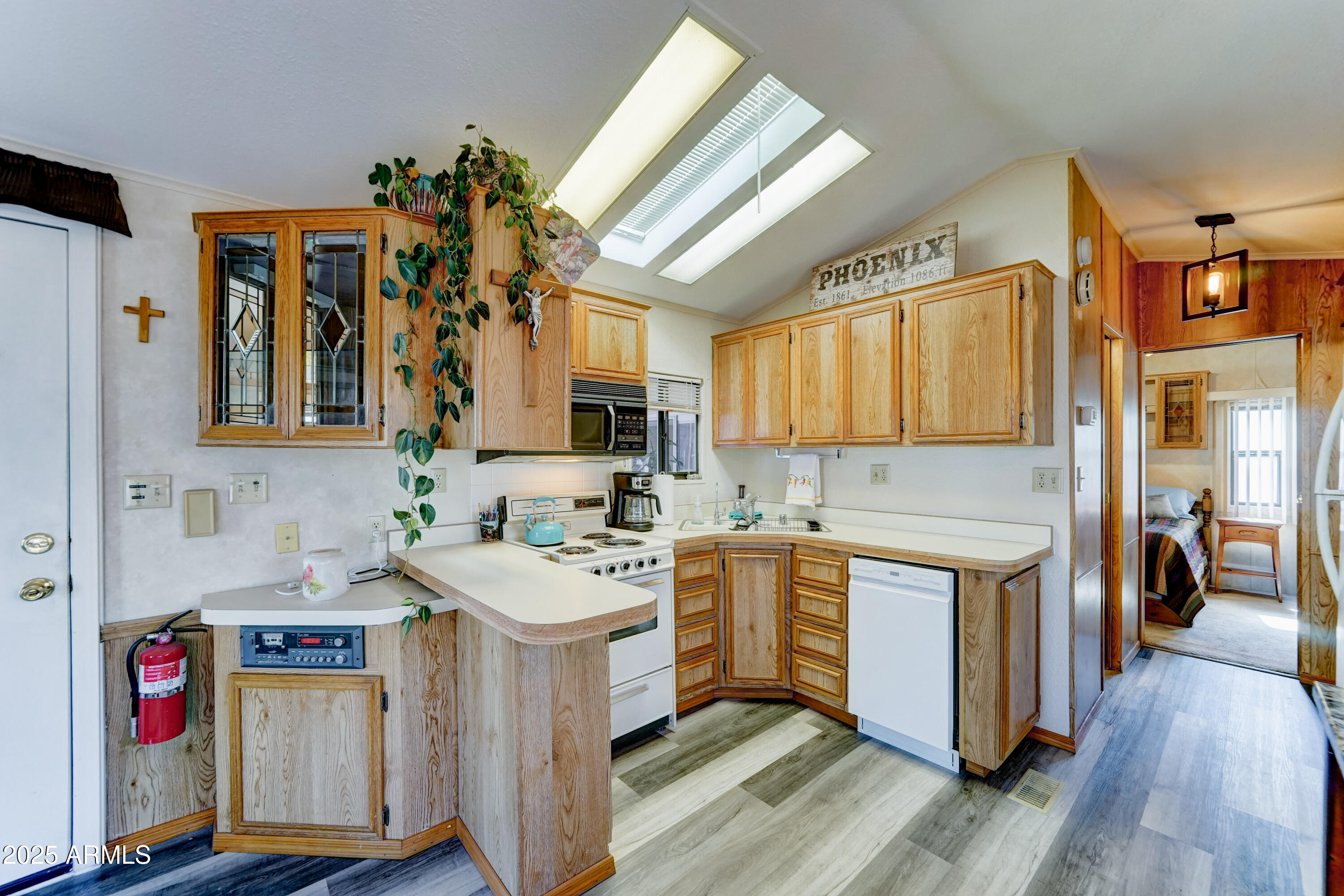 111 South Greenfield Road, Unit 547 Mesa, AZ 85206 - Photo 9 of 28 Skylight in kitchen