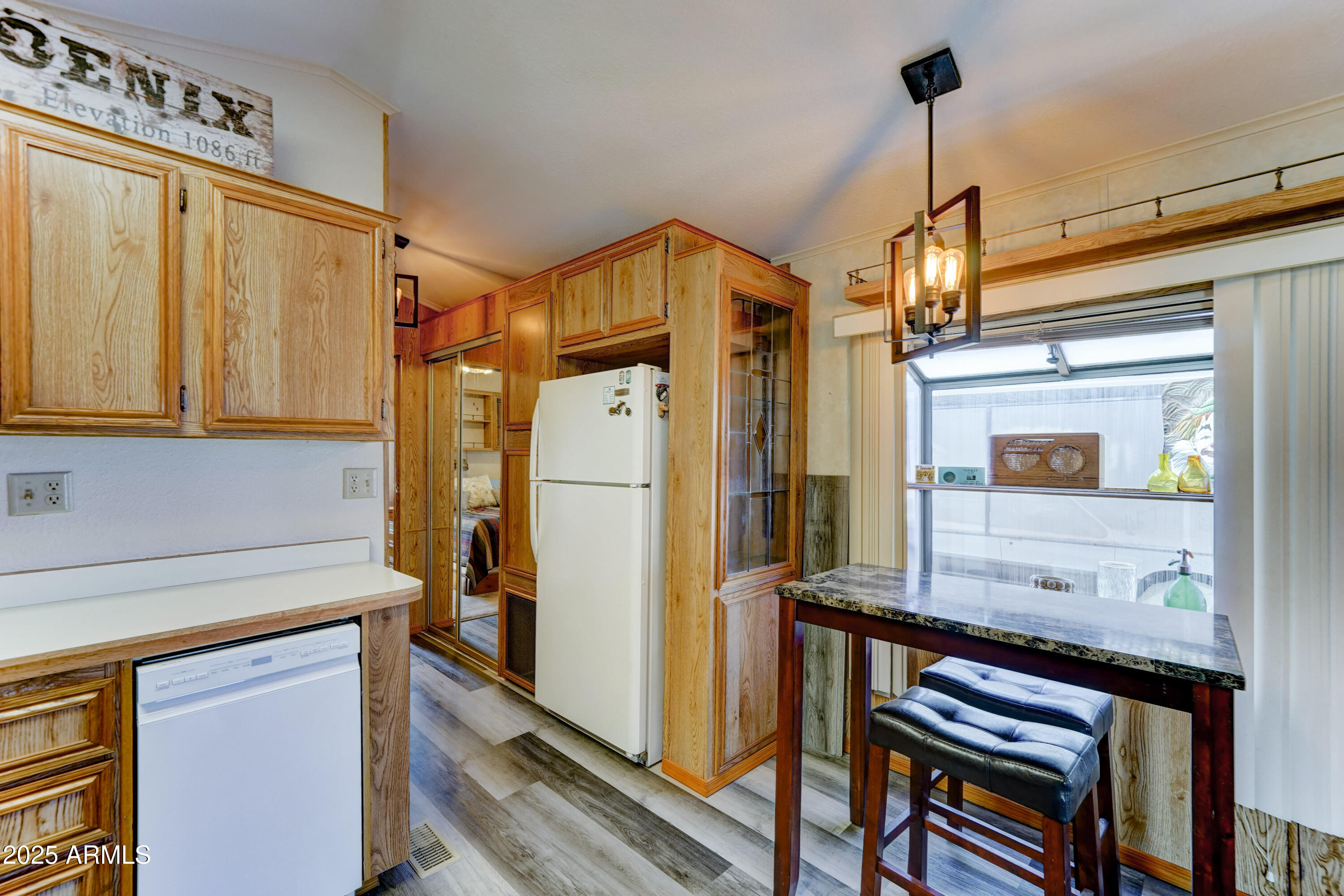 111 South Greenfield Road, Unit 547 Mesa, AZ 85206 - Photo 10 of 28 lots of storage in kitchen