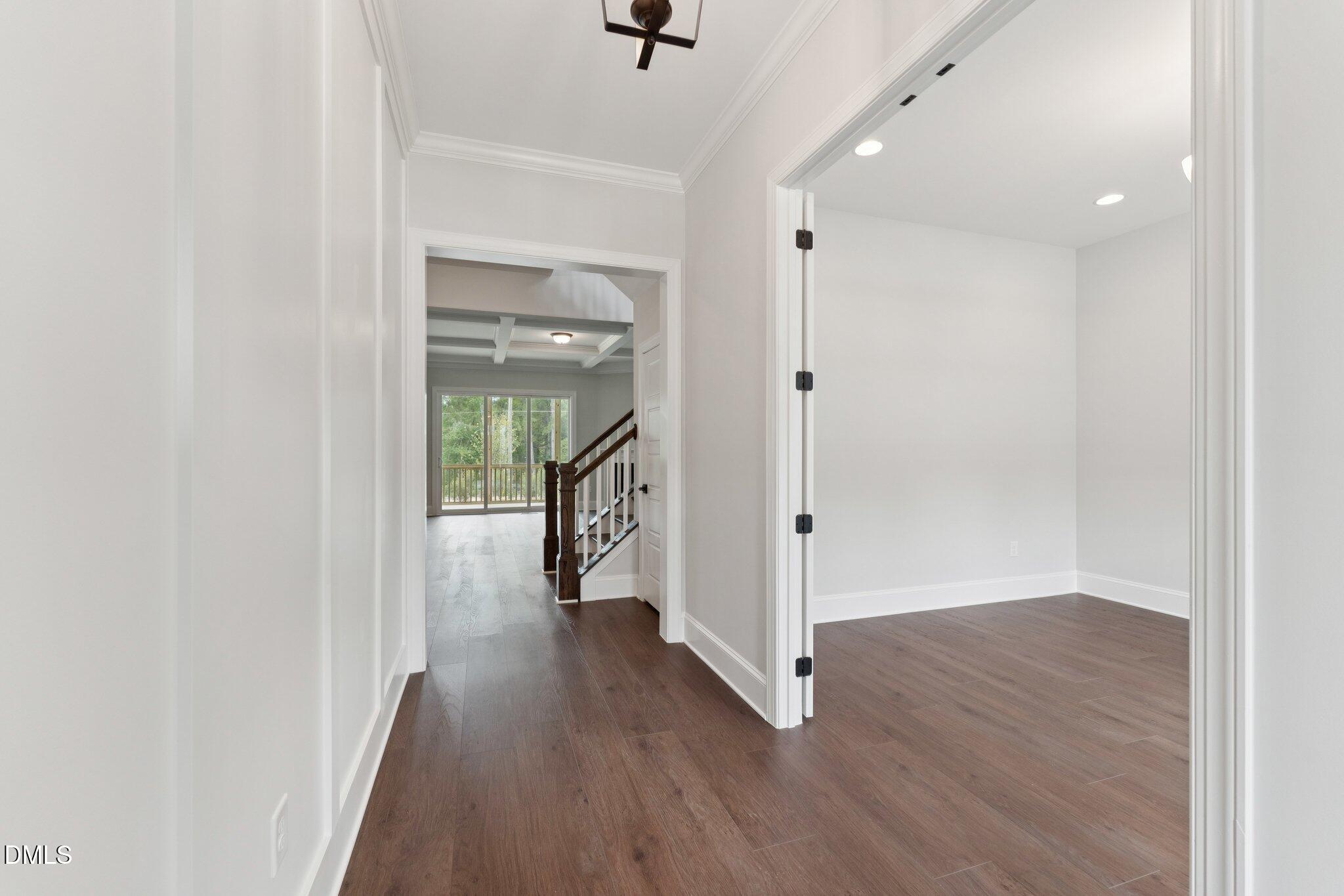 269 Ridge Road Chapel Hill, NC 27516 - Photo 2 of 41 a view of a hallway with wooden floor