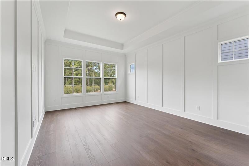 269 Ridge Road Chapel Hill, NC 27516 - Photo 22 of 41 wooden floor in an empty room with a window