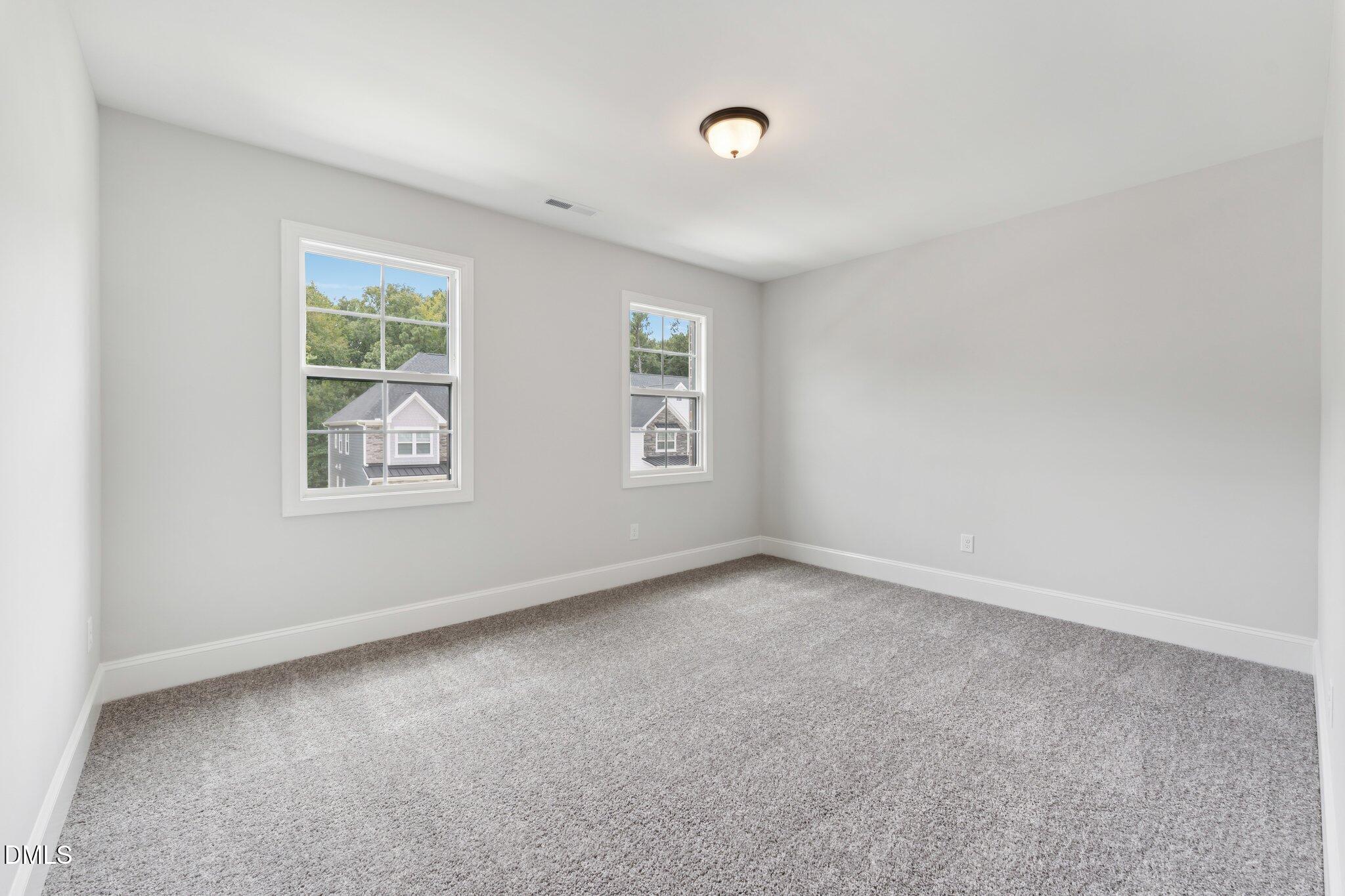 269 Ridge Road Chapel Hill, NC 27516 - Photo 30 of 41 an empty room with windows