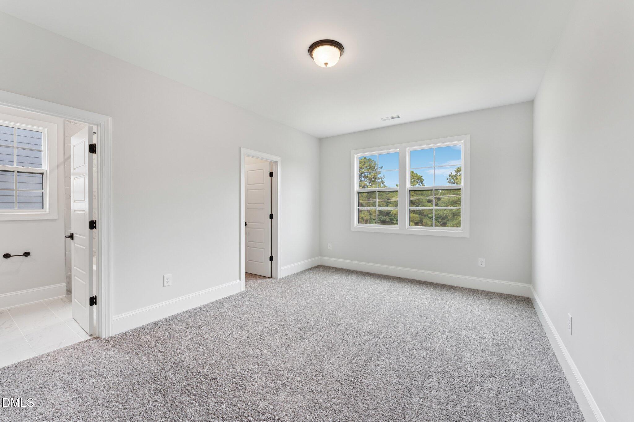 269 Ridge Road Chapel Hill, NC 27516 - Photo 32 of 41 an empty room with windows