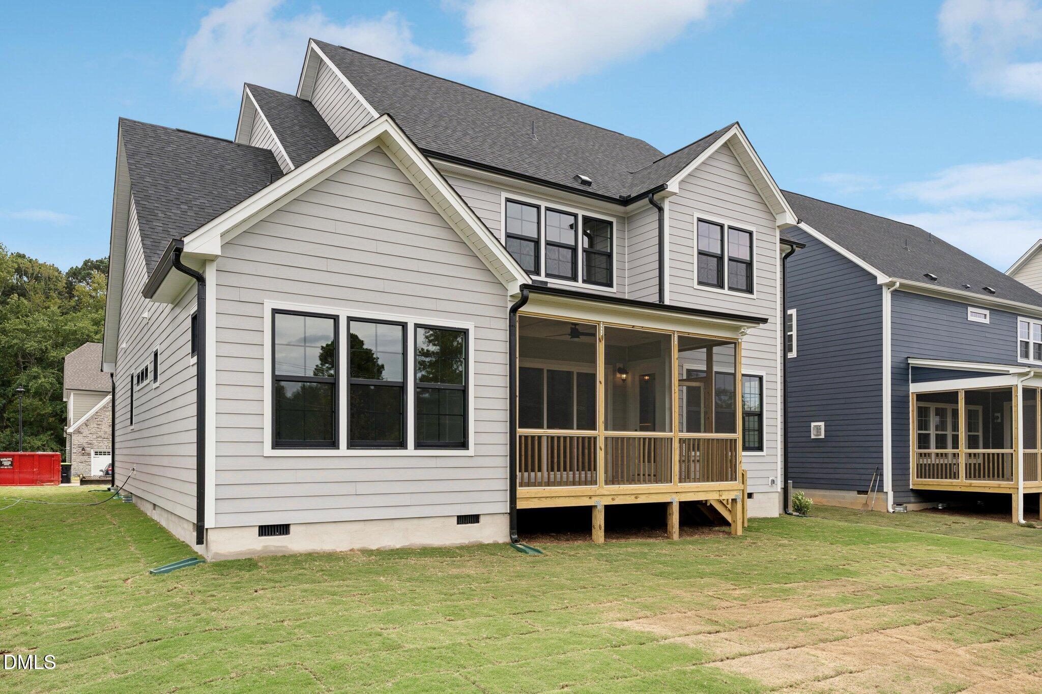 269 Ridge Road Chapel Hill, NC 27516 - Photo 38 of 41 a view of a house with a yard with wooden fence