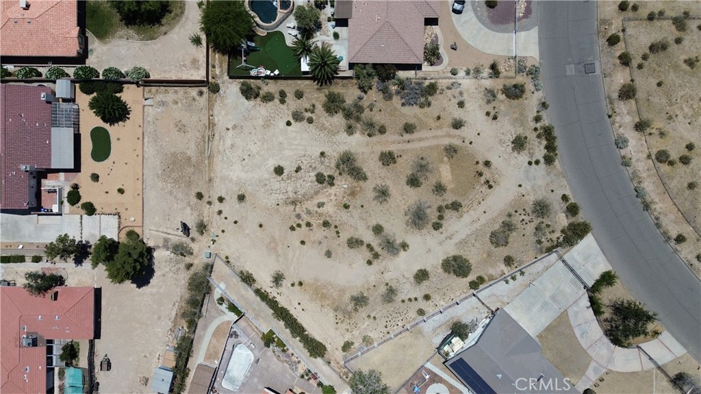47333203 Muni Road Apple Valley, CA 92307 - Photo 4 of 21 an aerial view of a house with a yard