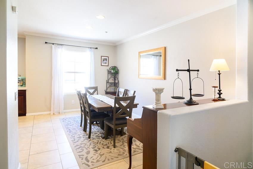 2232 Huntington Point Road, Unit 53 Chula Vista, CA 91914 - Photo 12 of 37 a view of a dining room with furniture