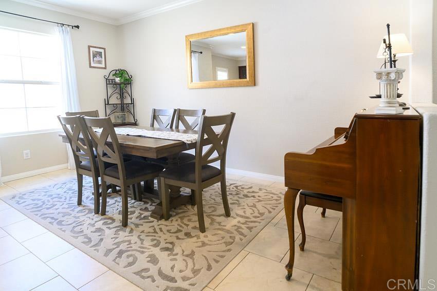 2232 Huntington Point Road, Unit 53 Chula Vista, CA 91914 - Photo 13 of 37 a view of a dining room with furniture