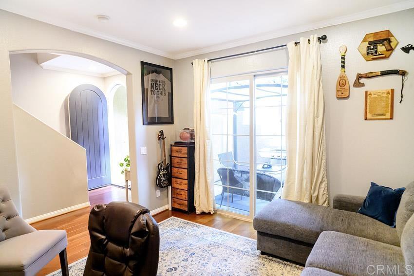 2232 Huntington Point Road, Unit 53 Chula Vista, CA 91914 - Photo 17 of 37 a living room with furniture and a window