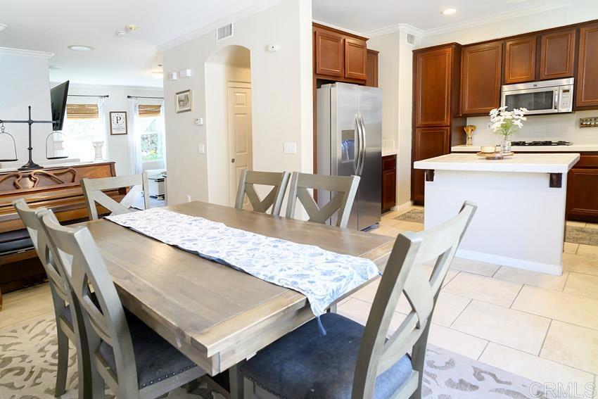 2232 Huntington Point Road, Unit 53 Chula Vista, CA 91914 - Photo 2 of 37 a view of a dining room with furniture