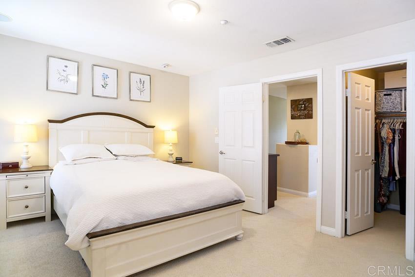 2232 Huntington Point Road, Unit 53 Chula Vista, CA 91914 - Photo 23 of 37 a bedroom with a bed and closet
