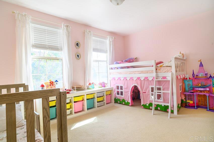 2232 Huntington Point Road, Unit 53 Chula Vista, CA 91914 - Photo 26 of 37 a view of livingroom with furniture and floor to ceiling window