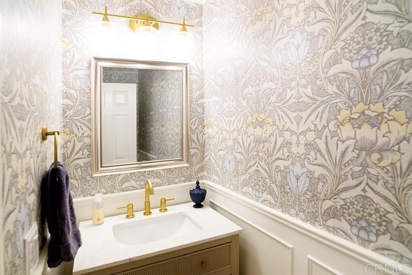 2232 Huntington Point Road, Unit 53 Chula Vista, CA 91914 - Photo 33 of 37 a bathroom with a sink and a mirror