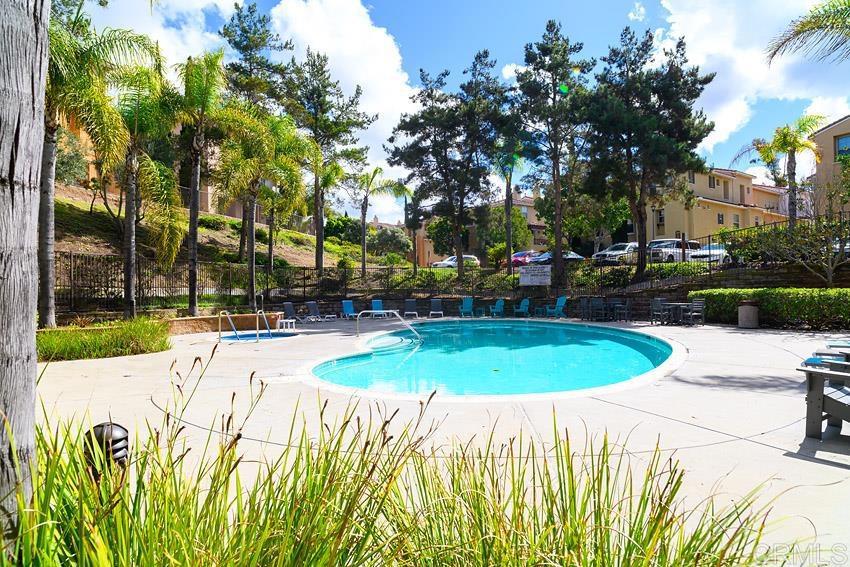 2232 Huntington Point Road, Unit 53 Chula Vista, CA 91914 - Photo 36 of 37 a view of a swimming pool with a patio