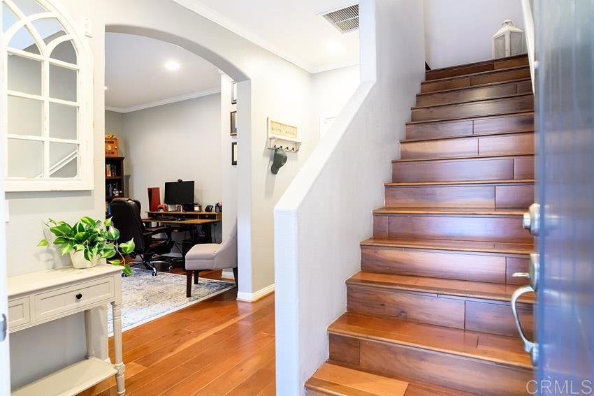 2232 Huntington Point Road, Unit 53 Chula Vista, CA 91914 - Photo 4 of 37 a view of entryway and hall with wooden floor