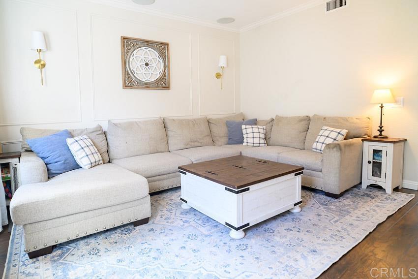 2232 Huntington Point Road, Unit 53 Chula Vista, CA 91914 - Photo 6 of 37 a living room with furniture and a couch