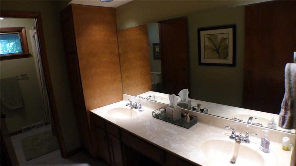 157 Countryview Drive McKees Rocks, PA 15136 - Photo 18 of 25 Full bath with dual sinks services bedrooms 2 & 3.