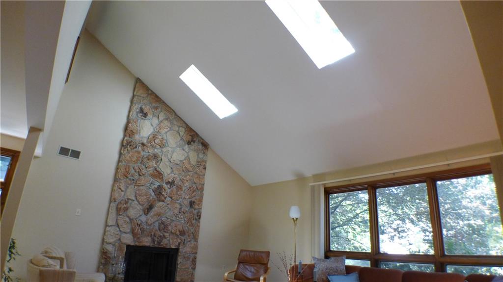 157 Countryview Drive McKees Rocks, PA 15136 - Photo 19 of 25 Vaulted ceilings with skylights allow the sunlight to flood in! Stone to the ceiling is a custom touch.