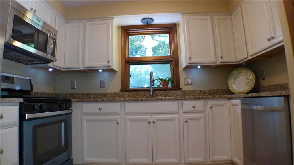 157 Countryview Drive McKees Rocks, PA 15136 - Photo 3 of 25 Be the 1st to use these stainless steel appliances, white cabinets, granite counters.
