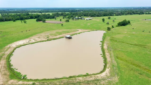 an aerial view of a golf course with a yard