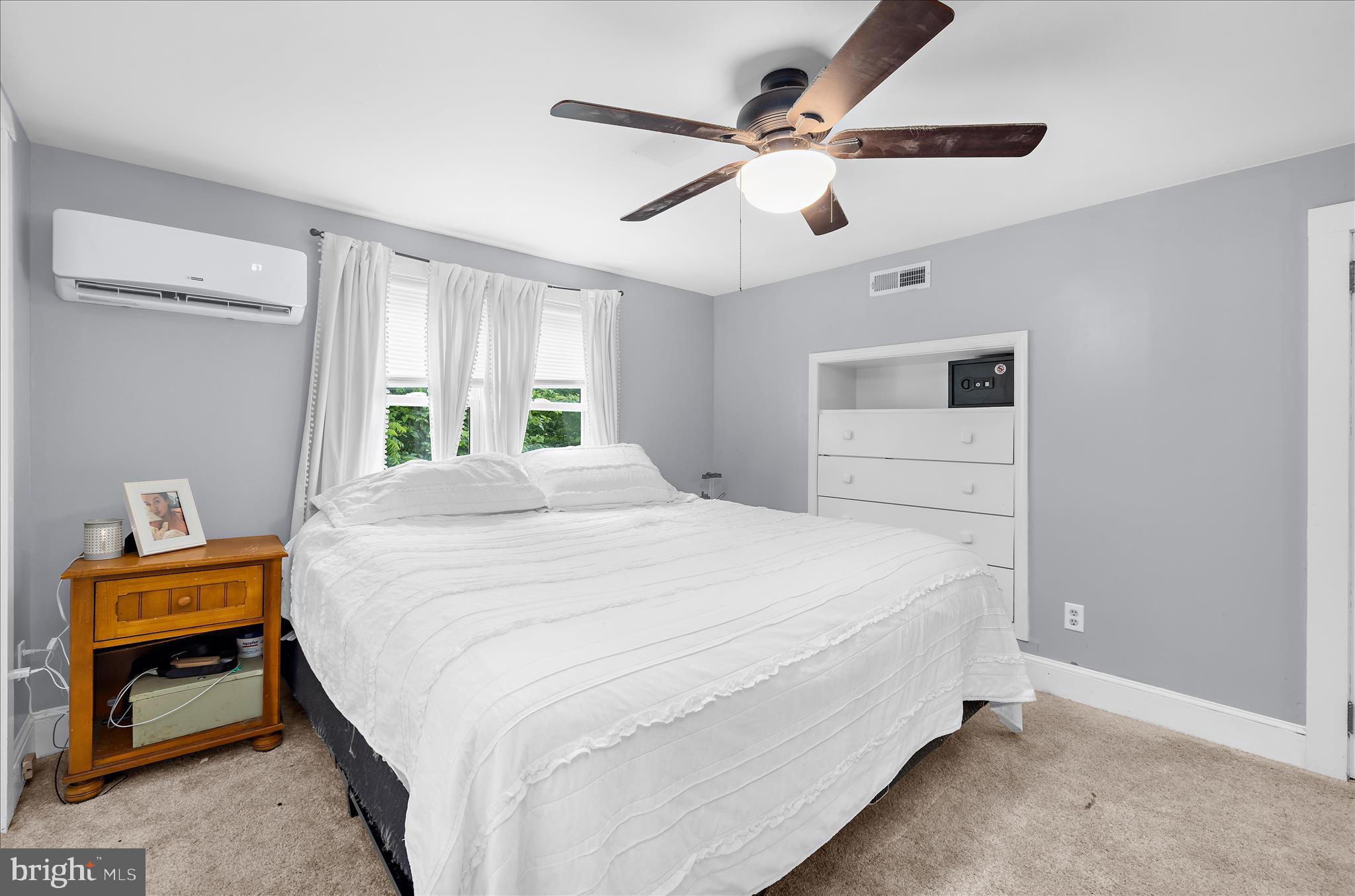 11994 Cordova Road Cordova, MD 21625 - Photo 29 of 57 a bedroom with a bed and a chandelier