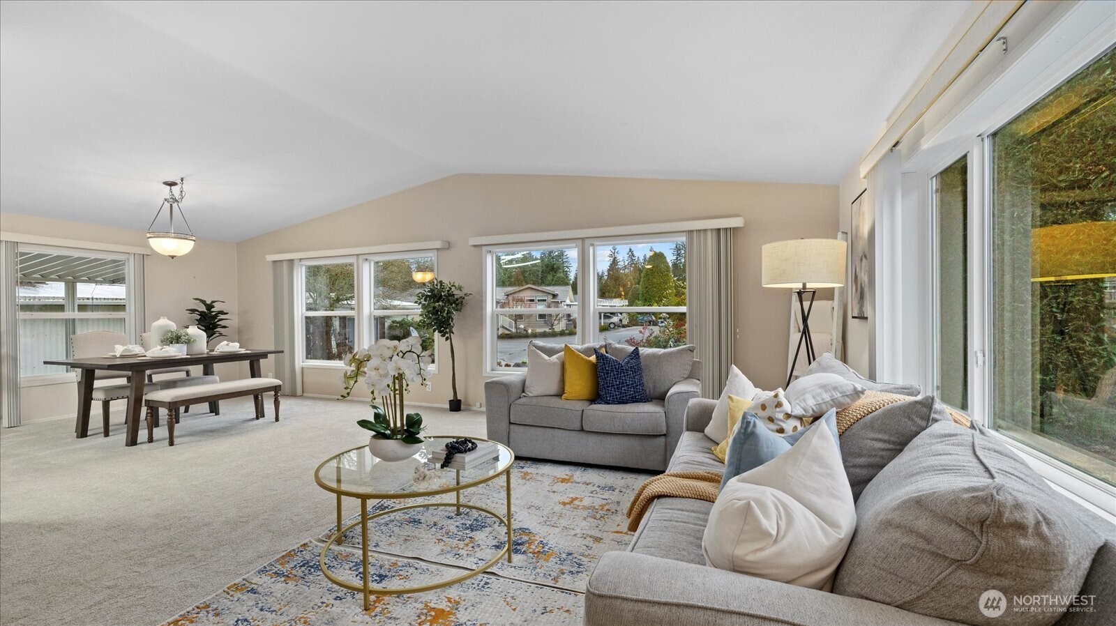 23825 15th Avenue Southeast, Unit 1 Bothell, WA 98021 - Photo 11 of 25 a living room with furniture and a large window