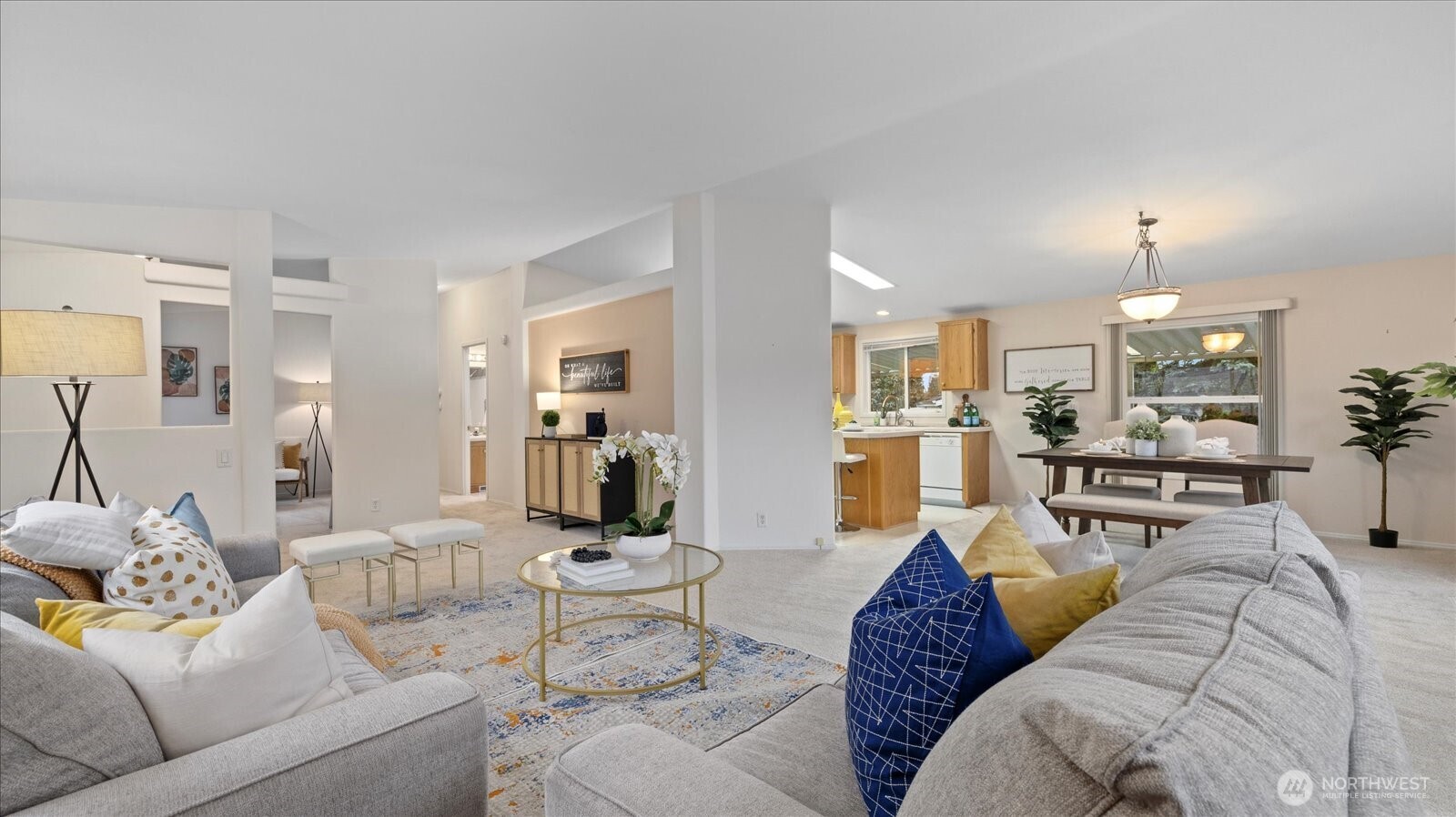 23825 15th Avenue Southeast, Unit 1 Bothell, WA 98021 - Photo 2 of 25 a living room with furniture and a view of kitchen