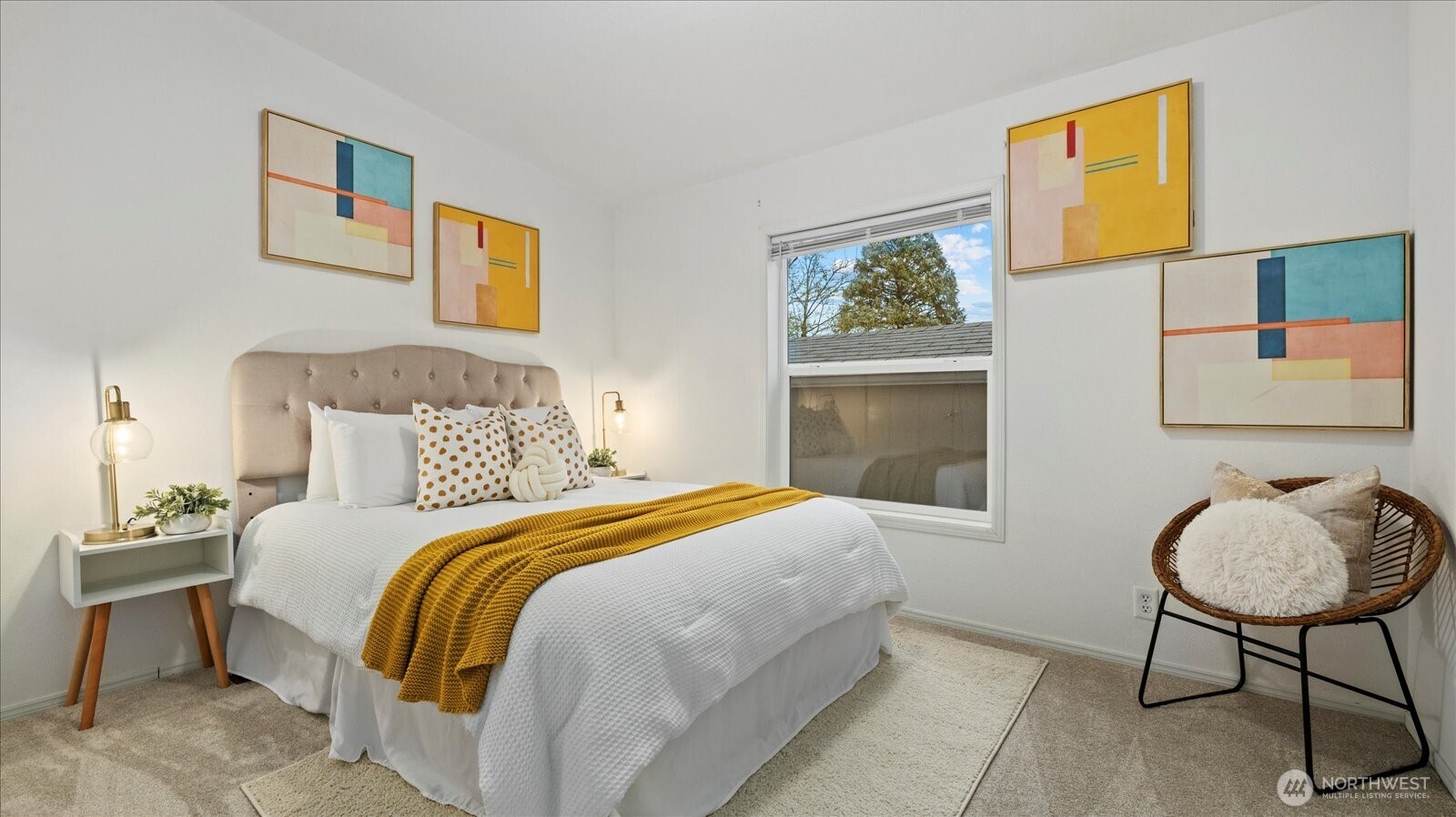 23825 15th Avenue Southeast, Unit 1 Bothell, WA 98021 - Photo 21 of 25 a bedroom with a bed and a chair