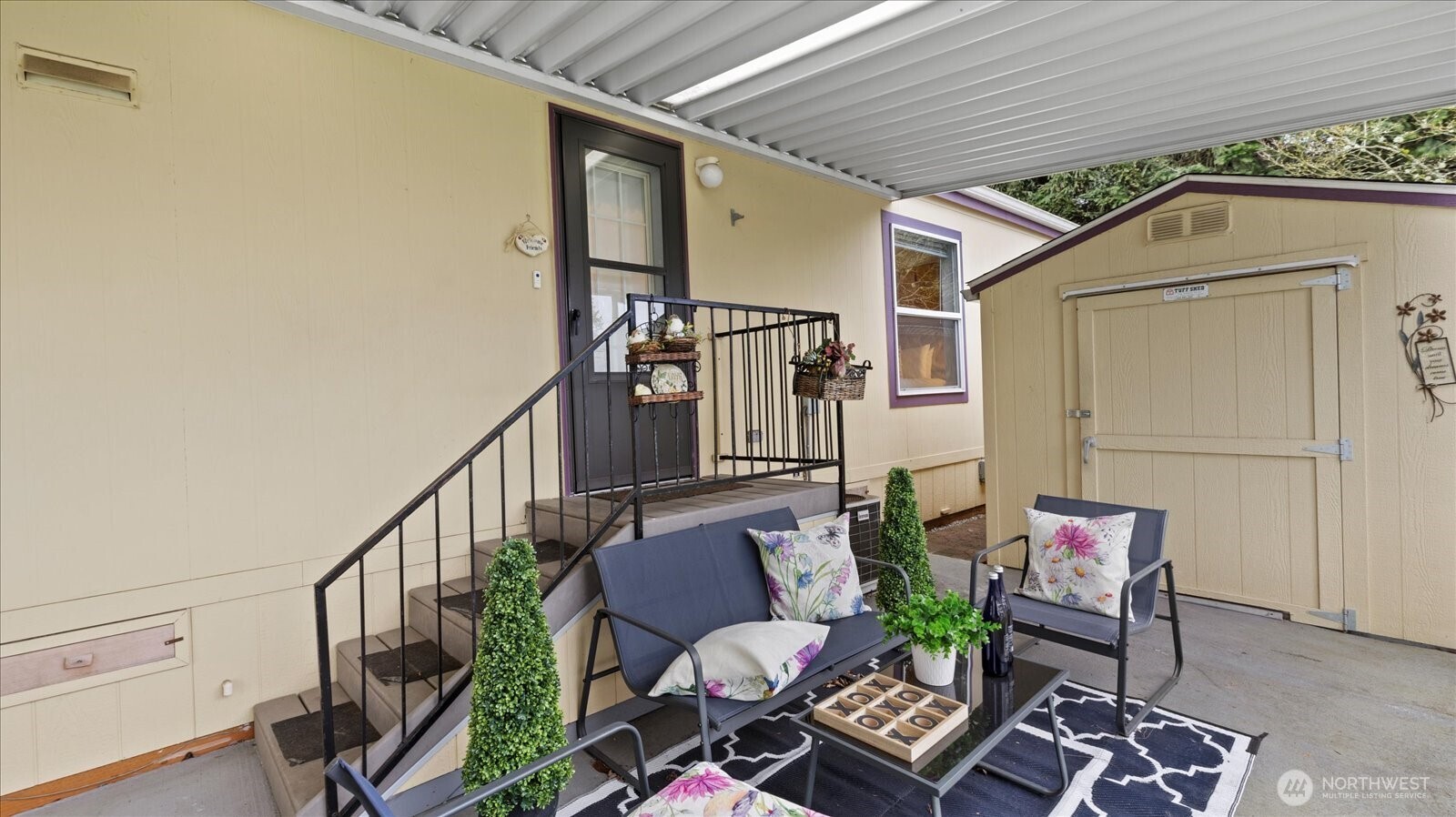 23825 15th Avenue Southeast, Unit 1 Bothell, WA 98021 - Photo 25 of 25 a view of a porch with furniture and wooden floor