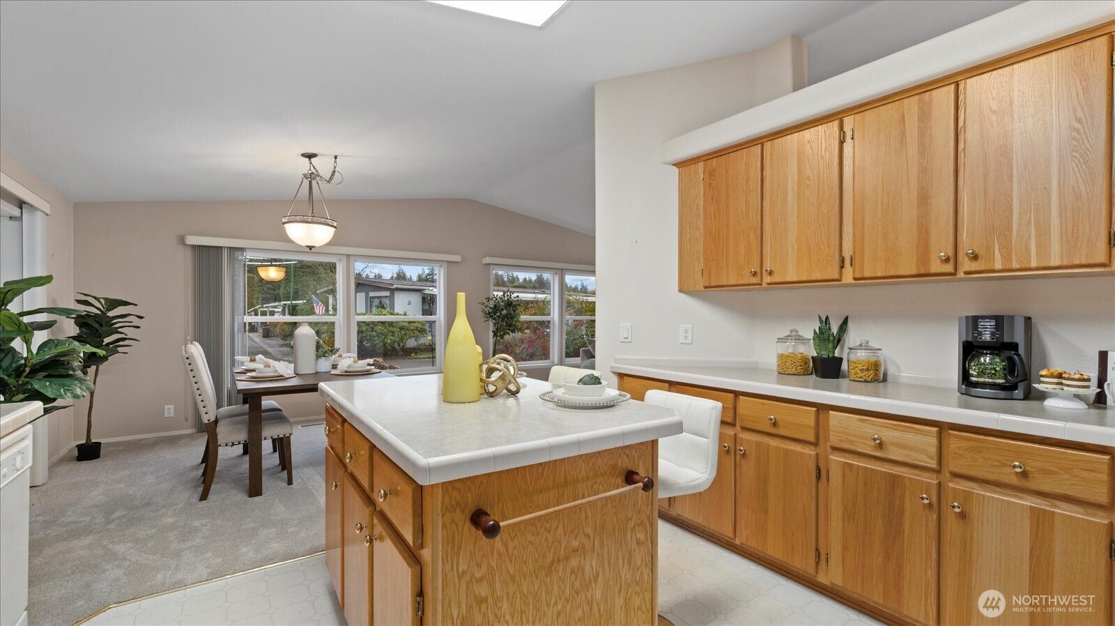 23825 15th Avenue Southeast, Unit 1 Bothell, WA 98021 - Photo 4 of 25 a kitchen with a sink stove and cabinets