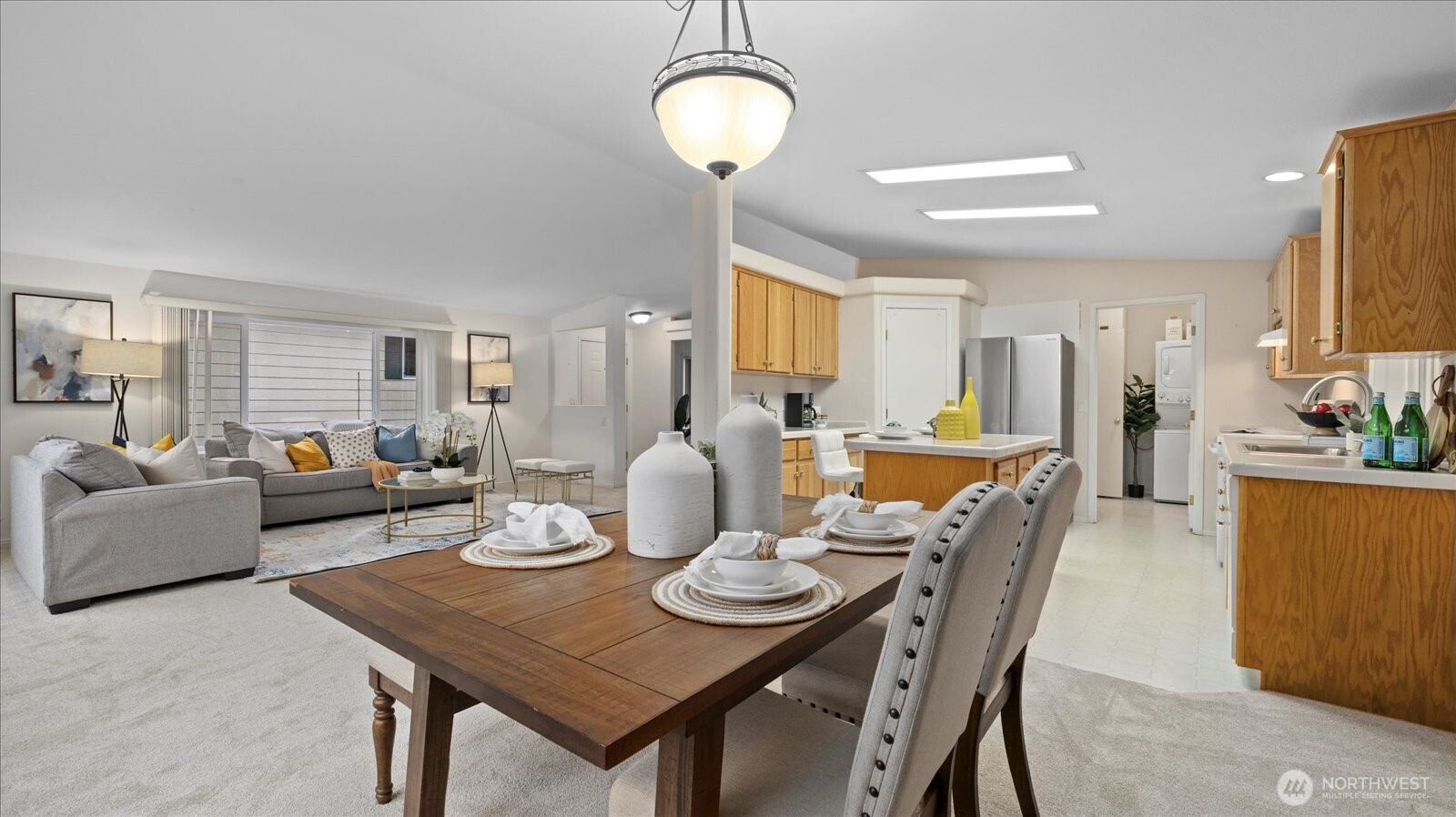 23825 15th Avenue Southeast, Unit 1 Bothell, WA 98021 - Photo 8 of 25 a view of a dining room with furniture and wooden floor