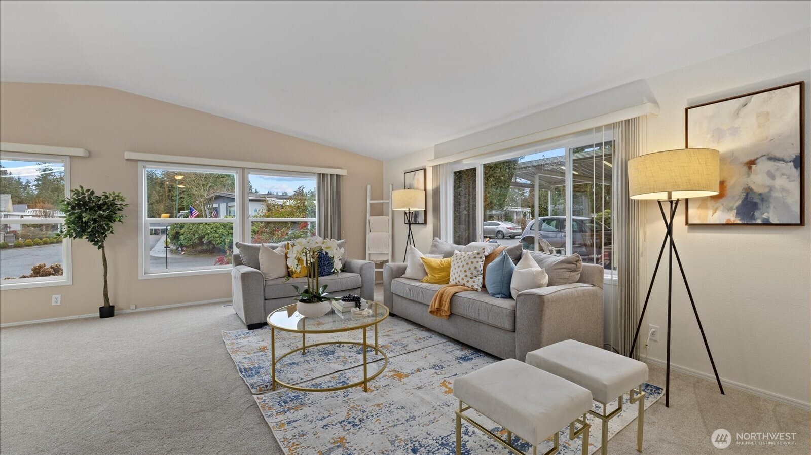 23825 15th Avenue Southeast, Unit 1 Bothell, WA 98021 - Photo 9 of 25 a living room with furniture and a large window
