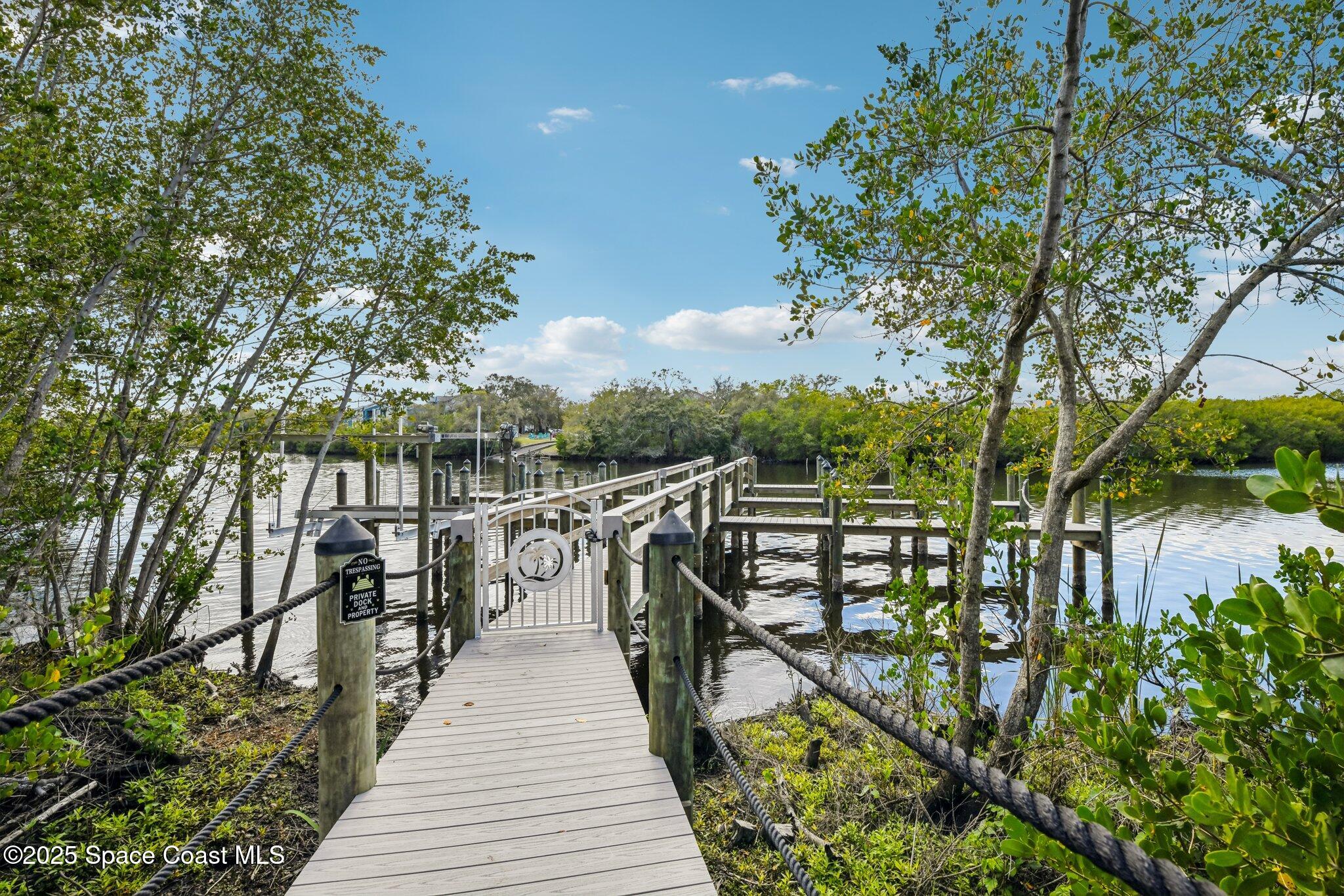 1405 Windchime Lane Melbourne, FL 32935 - Photo 3 of 48 a view of a balcony with wooden floor