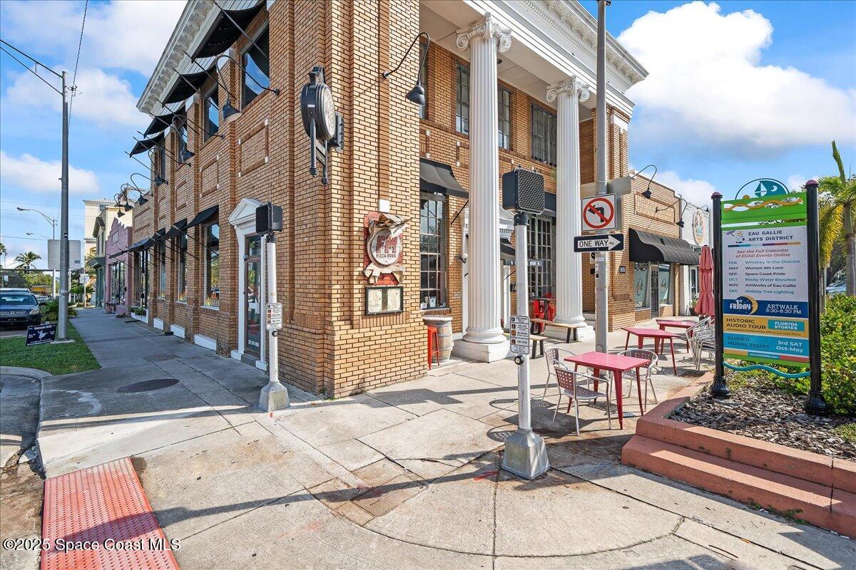 1405 Windchime Lane Melbourne, FL 32935 - Photo 44 of 48 a view of a building with sitting area