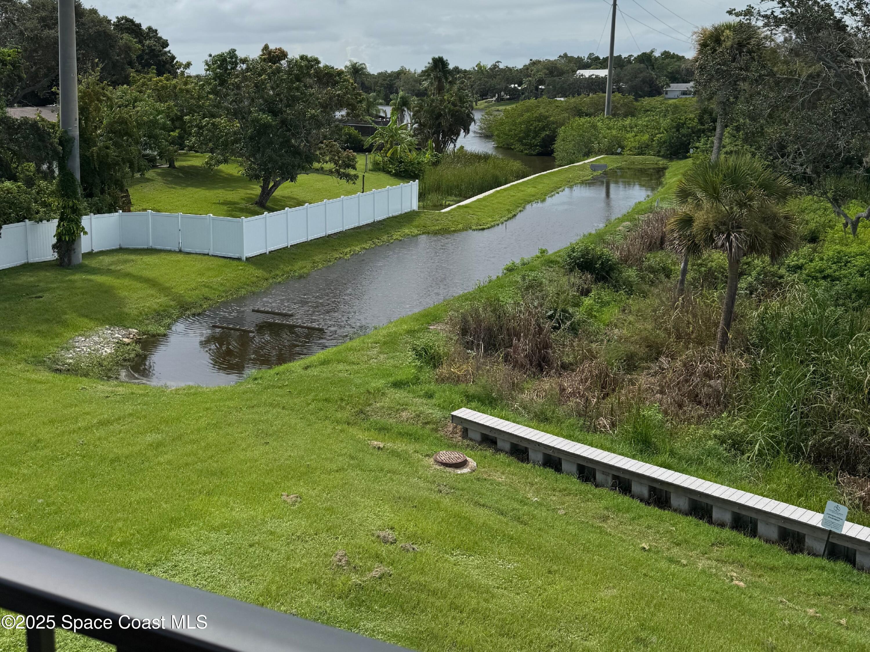 1405 Windchime Lane Melbourne, FL 32935 - Photo 5 of 48 a view of an outdoor space and a yard