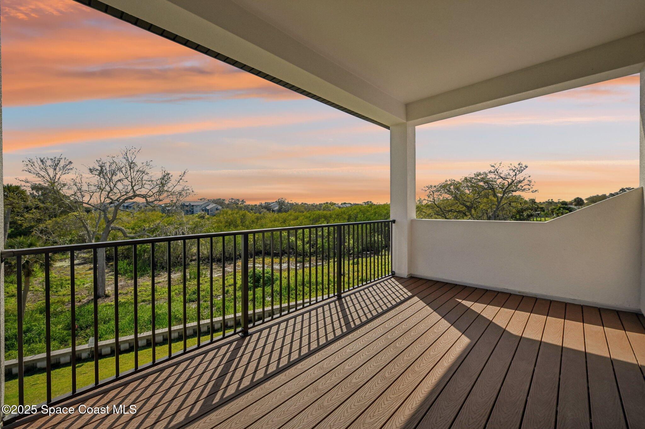 1405 Windchime Lane Melbourne, FL 32935 - Photo 7 of 48 a view of city from a balcony