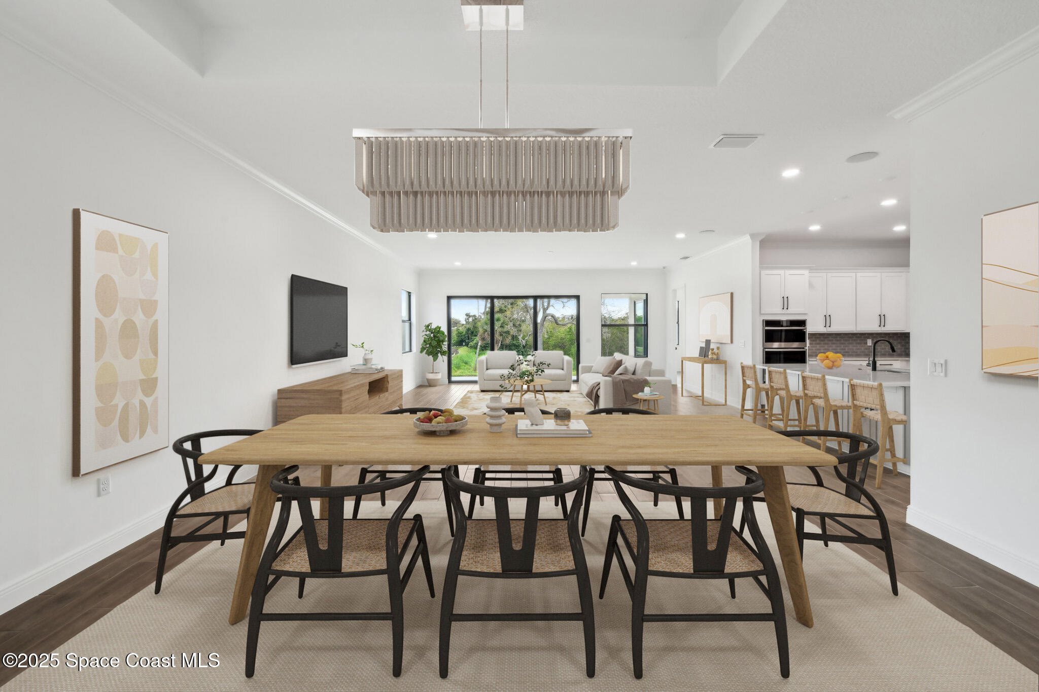 1405 Windchime Lane Melbourne, FL 32935 - Photo 10 of 48 a view of a dining room with furniture and wooden floor