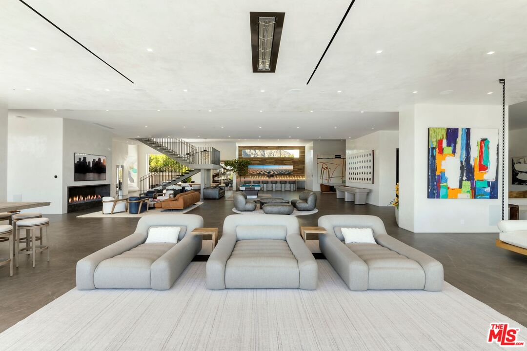 53804 Ross Avenue La Quinta, CA 92253 - Photo 14 of 29 a living room with furniture and a flat screen tv