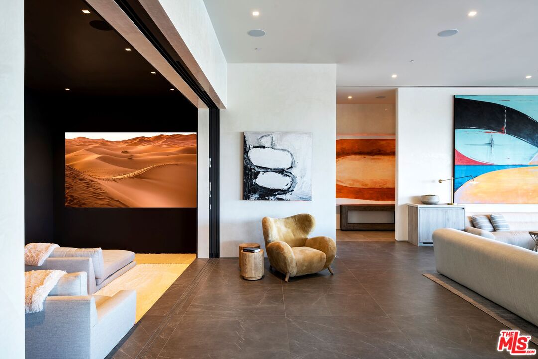 53804 Ross Avenue La Quinta, CA 92253 - Photo 21 of 29 a living room with furniture and a flat screen tv