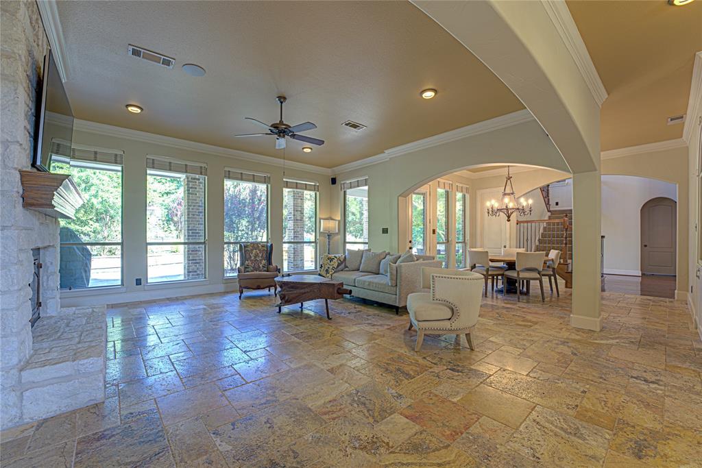 242 Ridgemont Road Heath, TX 75126 - Photo 12 of 36 Family room overlooks pool and backyard