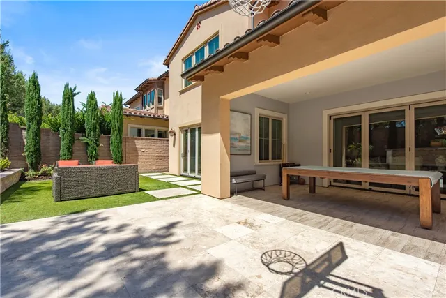 a bathroom with a granite countertop sink toilet a mirror a vanity and shower
