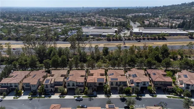 a view of swimming pool with outdoor seating and plants