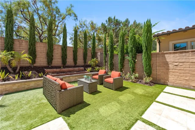 a view of a backyard with plants