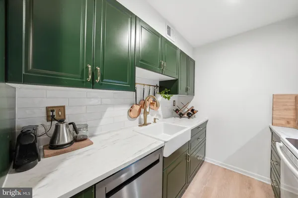 a bedroom with bed and flat screen tv
