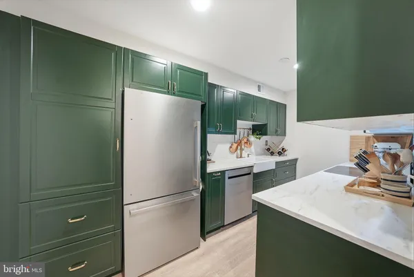 a bedroom with a bed and a television